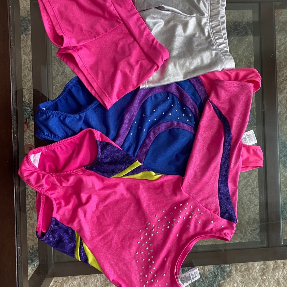 Lot of size 4/5 gymnastics leotards and shorts